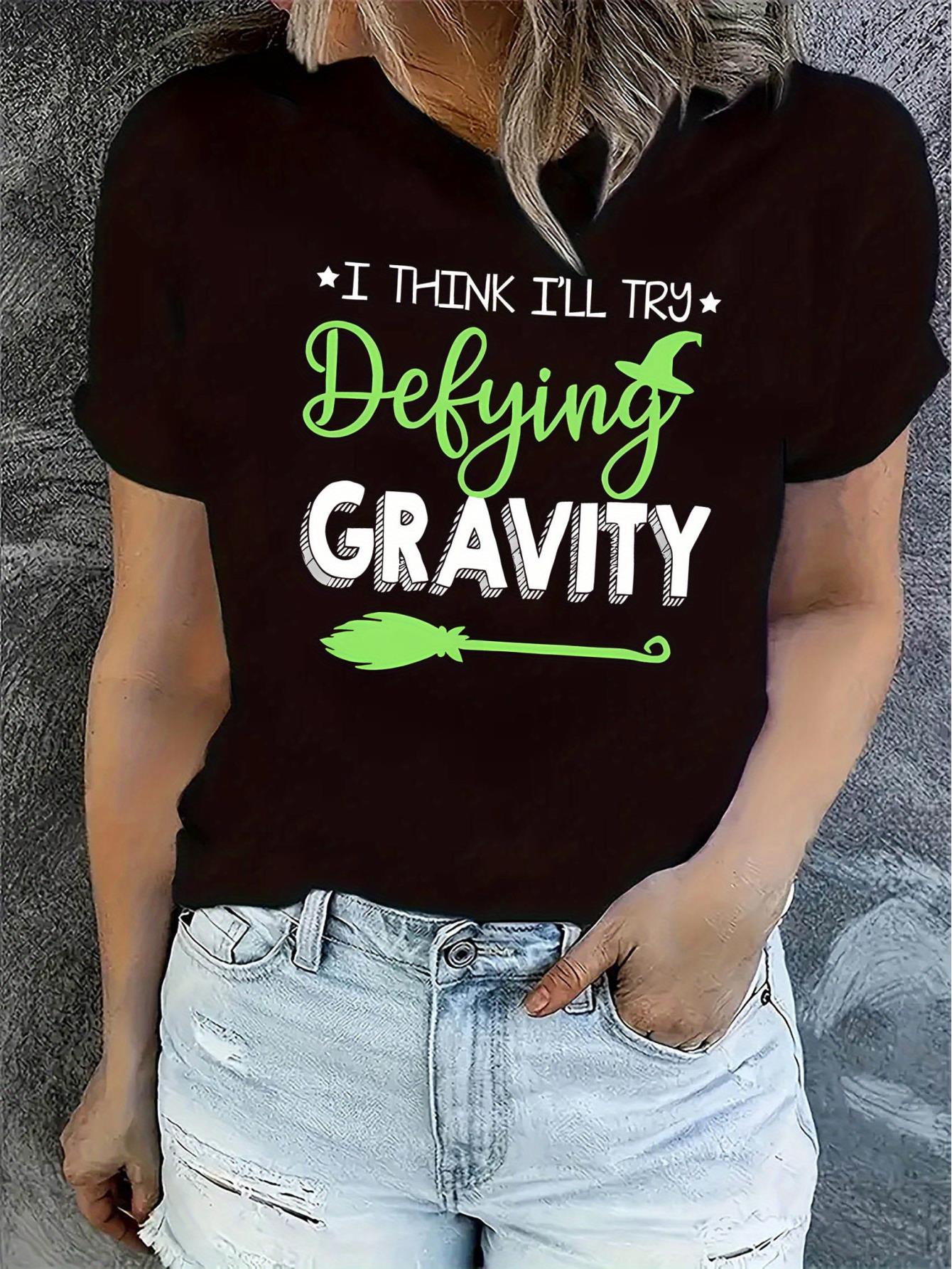 thumbnail image 1 of Women's "I for THINK I'll Try Defying Gravity" Graphic Tee - Casual Short Sleeve T-Shirt, Comfortable Summer Top, White with Green Letter Print, Polyester Blend, Machine Washable, 1 of 8
