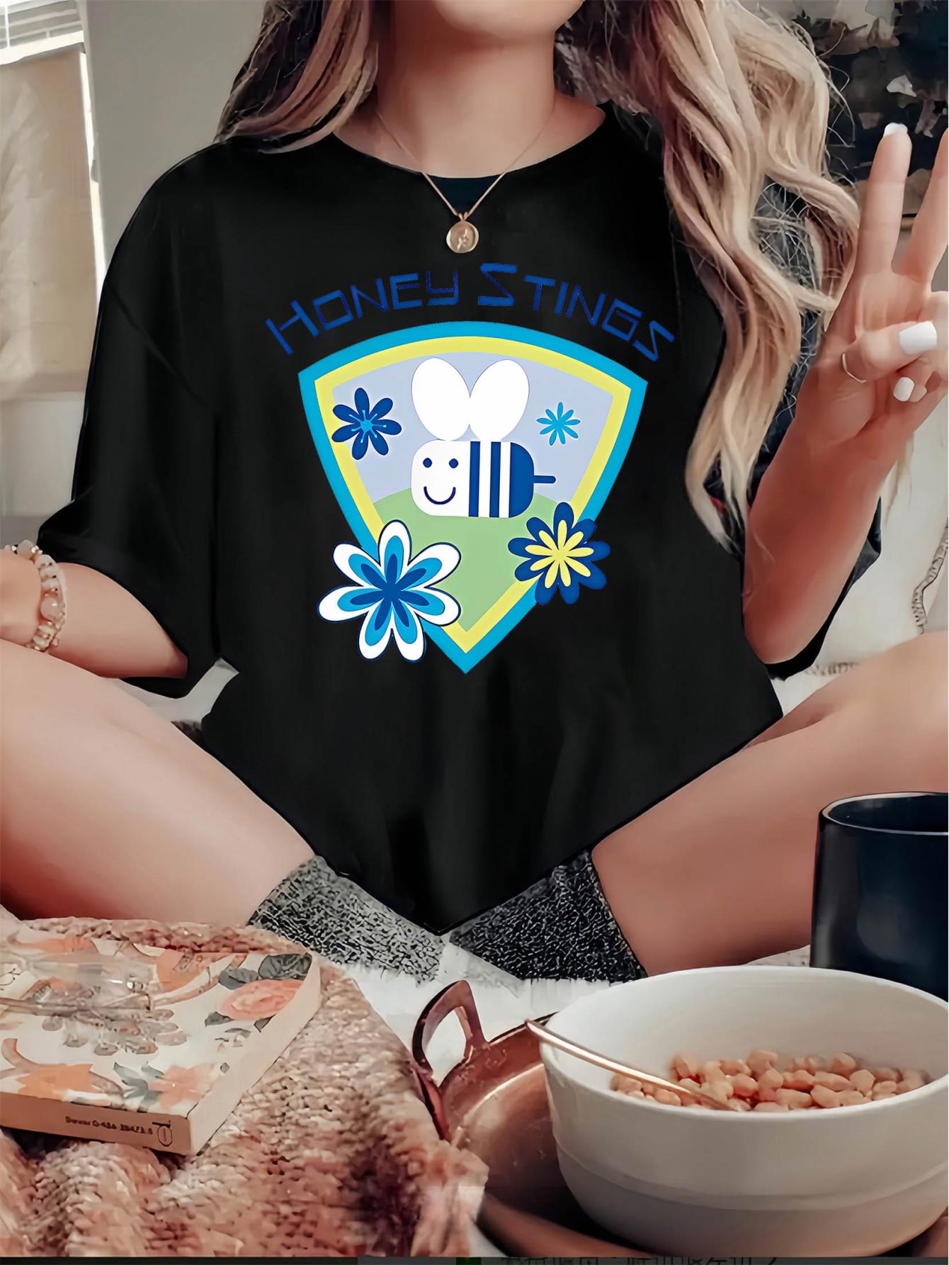 thumbnail image 1 of Women's Honey Stings Cartoon Bee & Flower Graphic T-Shirt - Soft, Comfortable Casual Summer Top, White Crew Neck Tee with Playful Design, Vacation Tshirt | Trendy Cartoon Shirt | Nontransparent Fabri, 1 of 8