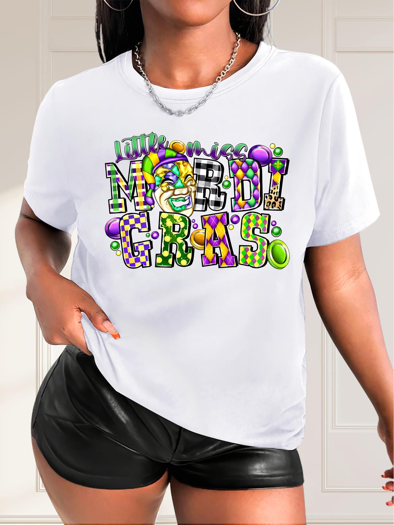 thumbnail image 1 of Casual Stylish Top for Black Women Featuring a Clown Mask Design with Various Shaped Letters, Round Neck, And Short Sleeves., 1 of 7