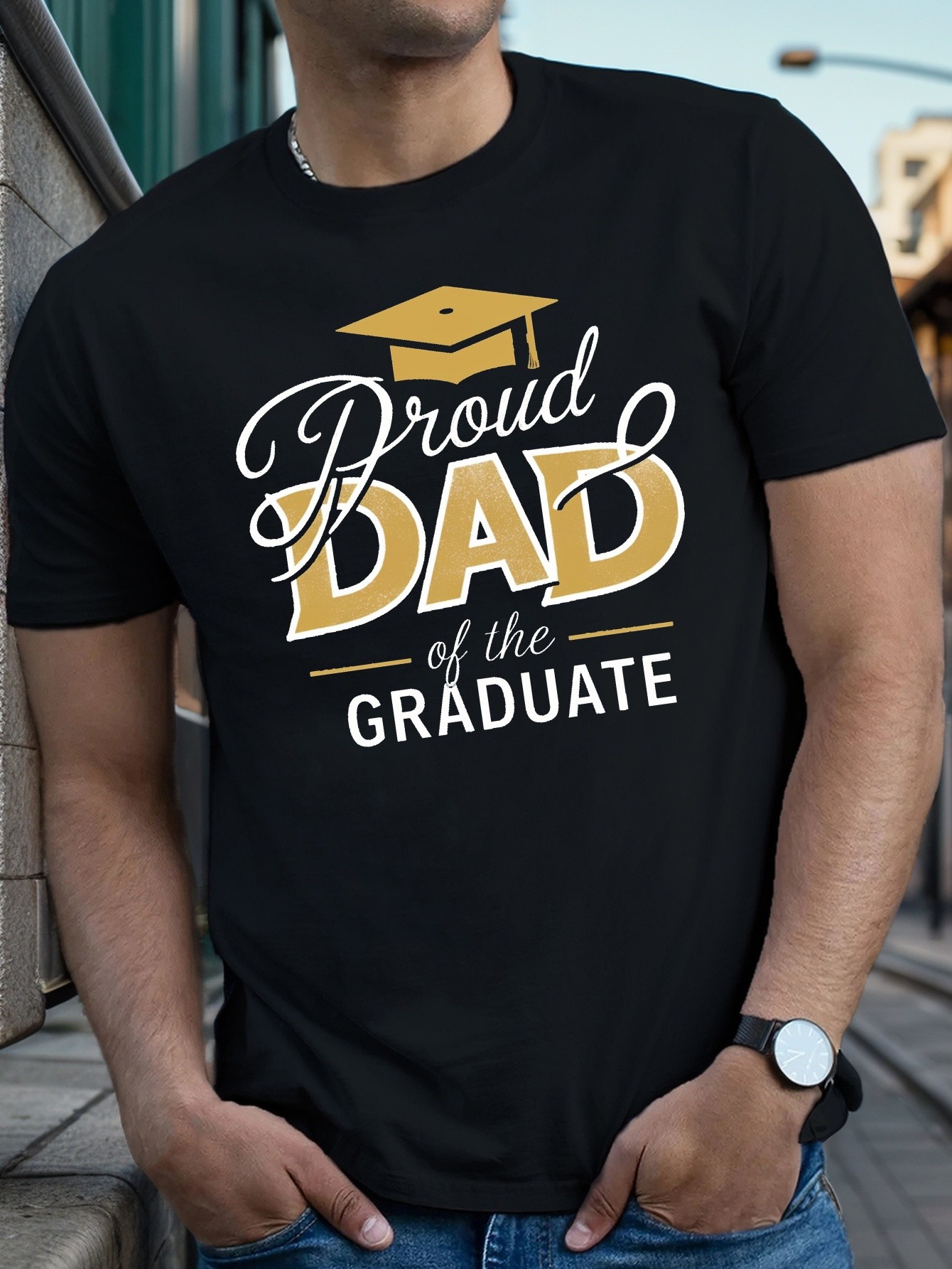 thumbnail image 1 of [Golden Cap Design T-Shirt] Golden Cap Design "Proud Dad of the Graduate" Men's Black T-Shirt - 100% Cotton, Crew Neck, Relaxed Fit, Breathable & Sweat-Absorbent - Spring/Summer Celebrations, 1 of 4